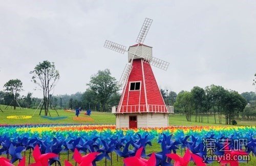 全国首家七彩风车节设计团队 地面风车造型设计 风车走