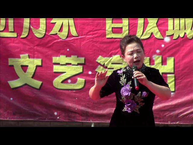 林海之声合唱团惠民村银行文艺演出。